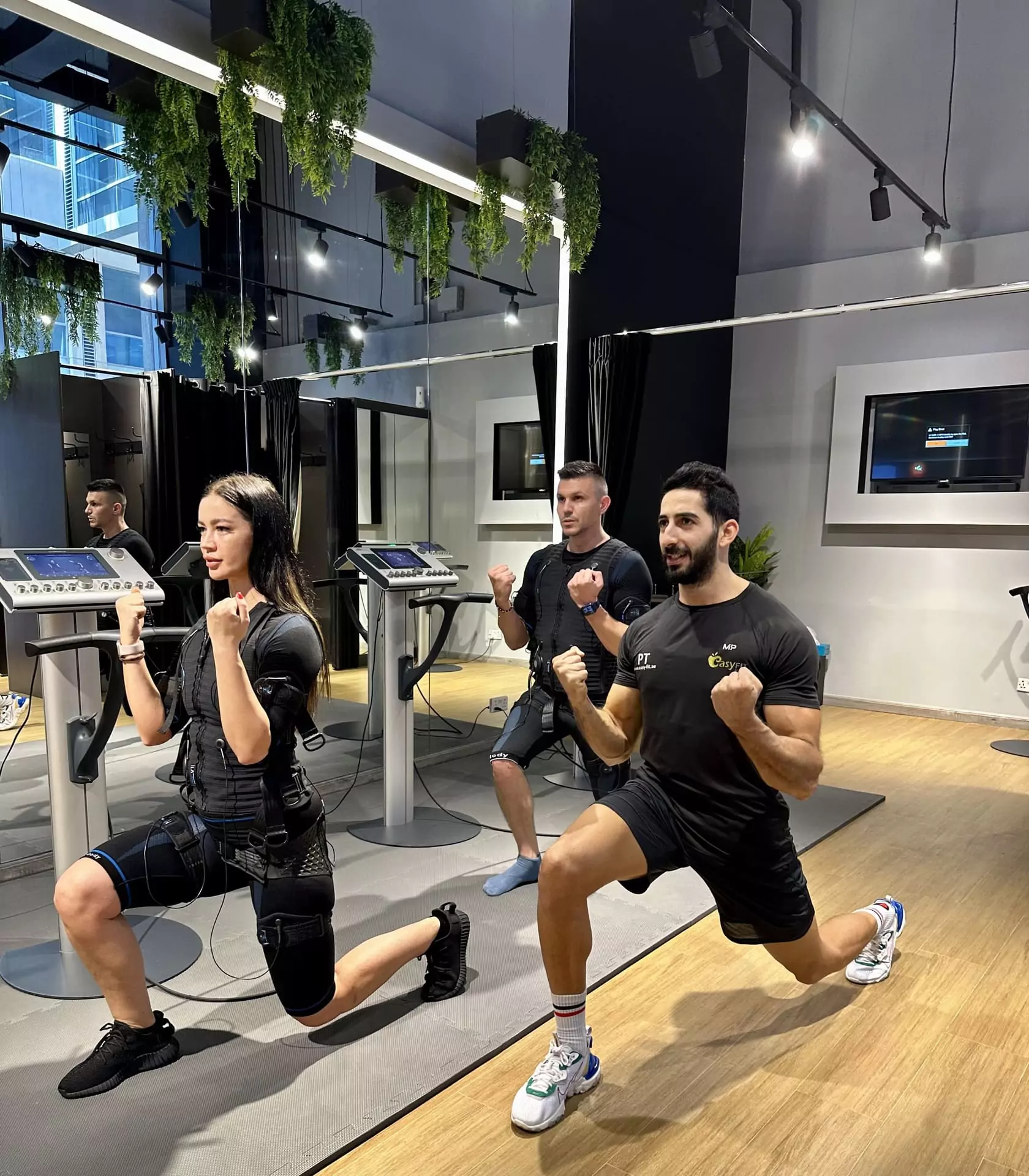 Easy Fit personal trainer leading an EMS workout
